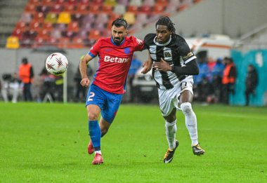 Valentin Cretu and Joel Monteiro pictured during the 2025/26 UEL Matchday 2 game Between FCSB (ROU) and BSC Young Boys (SWI).
