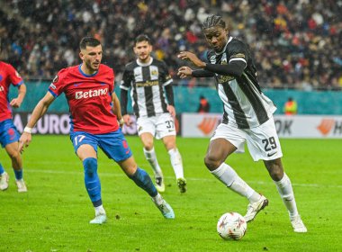 Mihai Popescu and Chris Bedia pictured during the 2025/26 UEL Matchday 2 game Between FCSB (ROU) and BSC Young Boys (SWI).q