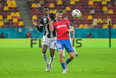 Edimilson Fernandes and Florin Tanase pictured during the 2025/26 UEL Matchday 2 game Between FCSB (ROU) and BSC Young Boys (SWI).