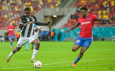 Sergio Cordova and Siyabonga Ngezana pictured during the 2025/26 UEL Matchday 2 game Between FCSB (ROU) and BSC Young Boys (SWI).