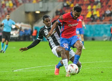 Sergio Cordova and Siyabonga Ngezana pictured during the 2025/26 UEL Matchday 2 game Between FCSB (ROU) and BSC Young Boys (SWI).