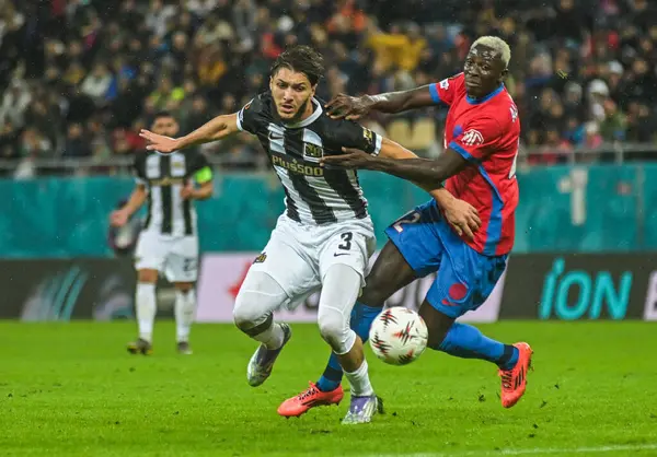 Jaouen Hadjam and Baba Alhassan pictured during the 2025/26 UEL Matchday 2 game Between FCSB (ROU) and BSC Young Boys (SWI).