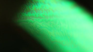 Yeşil sıvı fenomen yapısı, koyu arkaplanda yeşil yağlar, renkli soyut, sürrealist sanat, ışık çizgisi