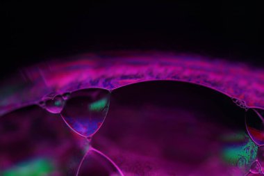 Makro pembe sıvı doku, parlak sıvı, makro kabarcıklar, mükemmel su formları, fantastik desen, parlak doku, makro arkaplan 