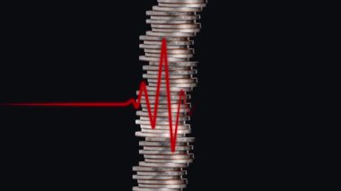 A coin tower and electrocardiogram. Concept of economic instability.