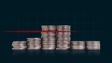 A pile of coins and a heartbeat graphic. Concept of economic crisis management.