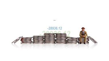 A pile of coins and graphics with a miniature man. Concept of successful asset management.