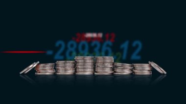 A pile of coins and graphics with heartbeat graph. Concepts about the finance crisis.