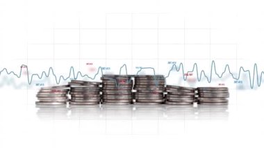 Pile of coins and linear graph with rapidly changing number. Graphs and business concepts.