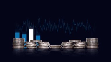 Business concept with piles of coins and graphs. The concept of floating exchange rates and yields.
