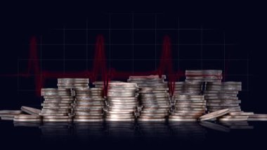 Business concept with coins and graphics. Pile of coins and heartbeat graph.