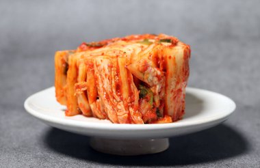 Food made from cabbage stored and eaten after fermentation. Korean traditional fermented food Baechu-kimchi. clipart