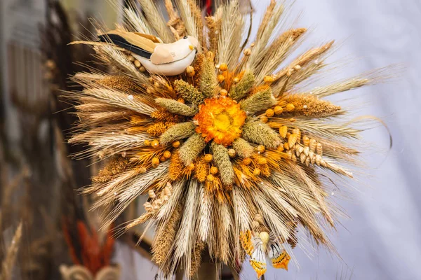 Traditional Lithuanian Easter palm made of dried flowers, ears of wheat, willow, birch, pussy-willow and juniper branches, that is then blessed in churches across Lithuania on Easter Sunday, close up