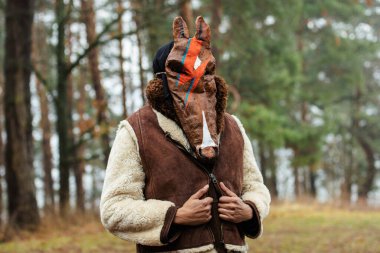 Rumsiskes, Lithuania - March 1 2025: Traditional mask in Rumsiskes, Lithuania during Uzgavenes, a Lithuanian folk festival during carnival, seventh week before Easte clipart