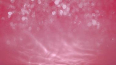 Soyut pembe gül köpüklü su parlaklığı sahte döngü arka planı. Lüks vitrin ürünü sırt plakası için 3D tasvirler. Zarif bahar ve yaz sezonu arka plan şablonu.