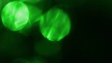 Bokeh ile soyut yeşil ve siyah arkaplan