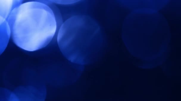 深蓝色波克环背景效应叠加 柔和色调的动态脱焦装饰模板复制空间背板 宏观特写辉光效果产品展示背景动画 — 图库视频影像