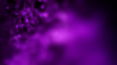 Soyut mor renk ve pembe bokeh döngü arka plan efekti. Yumuşak tonlu, titreşimli, odaklanmış dekor şablonu kopyalanmış uzay arka plakası. Makro yakın çekim ışıltı efekti ürün gösterimi arkaplan canlandırması.