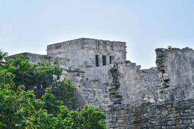 The Mayan citadel of Tulum on Caribbean SeaTulum was built to be a harbor fortress, on ocean cliffs, providing protection from the East and a limestone wall surrounding rest of city on three sides