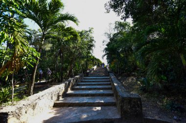 The Mayan citadel of Tulum on Caribbean SeaTulum was built to be a harbor fortress, on ocean cliffs, providing protection from the East and a limestone wall surrounding rest of city on three sides