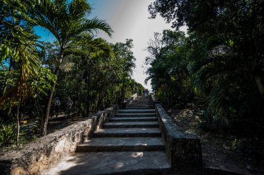 The Mayan citadel of Tulum on Caribbean SeaTulum was built to be a harbor fortress, on ocean cliffs, providing protection from the East and a limestone wall surrounding rest of city on three sides
