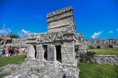 The Mayan citadel of Tulum on Caribbean SeaTulum was built to be a harbor fortress, on ocean cliffs, providing protection from the East and a limestone wall surrounding rest of city on three sides