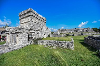 The Mayan citadel of Tulum on Caribbean SeaTulum was built to be a harbor fortress, on ocean cliffs, providing protection from the East and a limestone wall surrounding rest of city on three sides