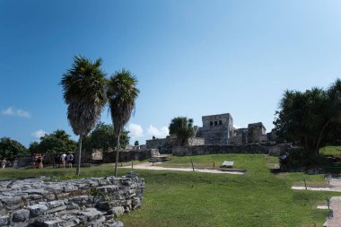 The Mayan citadel of Tulum on Caribbean SeaTulum was built to be a harbor fortress, on ocean cliffs, providing protection from the East and a limestone wall surrounding rest of city on three sides
