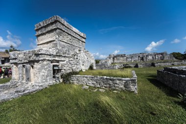 The Mayan citadel of Tulum on Caribbean SeaTulum was built to be a harbor fortress, on ocean cliffs, providing protection from the East and a limestone wall surrounding rest of city on three sides