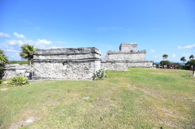 The Mayan citadel of Tulum on Caribbean SeaTulum was built to be a harbor fortress, on ocean cliffs, providing protection from the East and a limestone wall surrounding rest of city on three sides