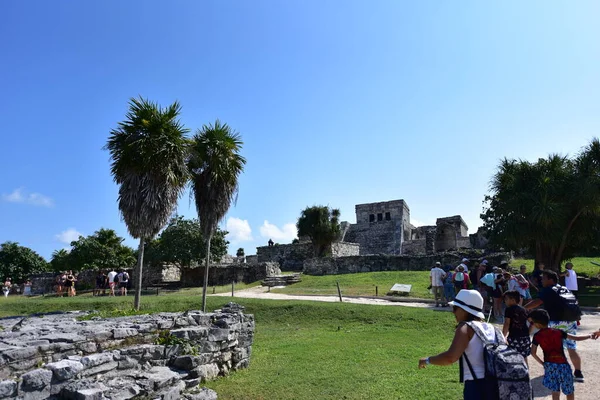 Tourists in Caribbean Sea, the jungle and Tulum fortressMost idyllic and impressive places in Latin America are turquoise sea,Caribbean beaches,jungle and Tulum fortress