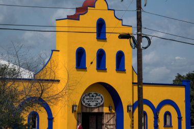 Old pavilion, terraces,traditional buildings,tropical plants in Riviera Maya, a Mexican paradise famous for its tourist base with luxury hotels and restaurants.