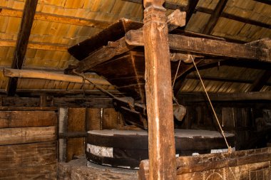wooden barrel in the barn of the old russian village.