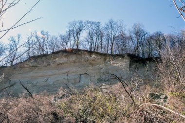 the ruins of an old stone quarry in the city of the dead sea