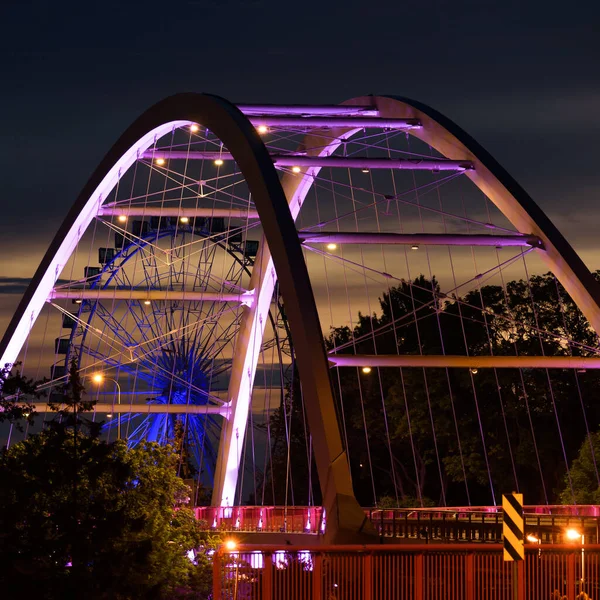 Stock image BRIDGE OVER THE RIVER - An object of urban infrastructure in night illumination