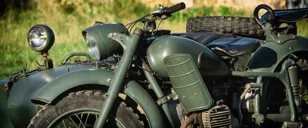 MILITARY MOTORCYCLE - An old Soviet machine in camouflage colors