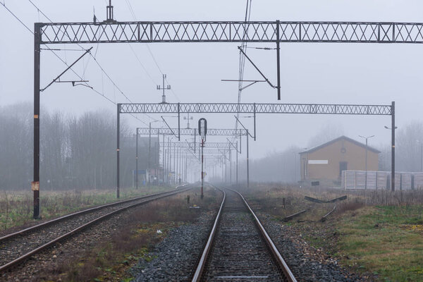 RAILWAY TRAIL - Foggy weather over transport infrastructure