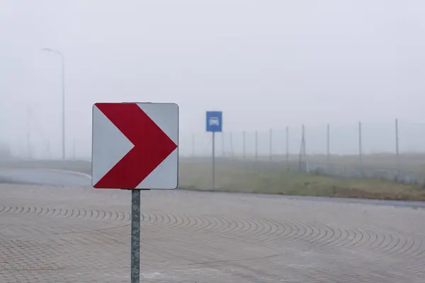 MISTY WEATHER - Road sign at the entrance to the expressway