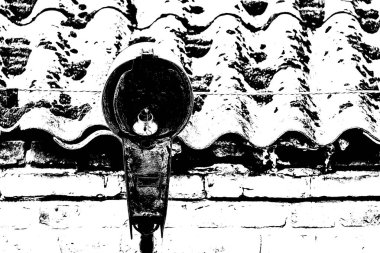 STREET LAMP - Very old and destroyed lantern on an old brick building with an asbestos roof clipart