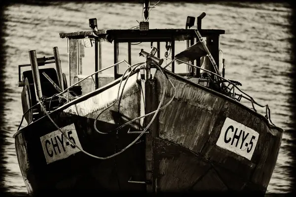 stock image CHLOPY, WEST POMERANIAN - POLAND - MAY 11, 2023: FISHING BOAT - Small ship on the sea shore