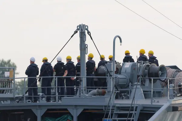 stock image GDYNIA, POMERANIAN REGION - POLAND - MAY 27, 2024: Crew on deck a warship