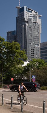 GDYNIA, POMERANIAN REGION - POLAND - MAY 27, 2024: Washington Street and SKY TOWER building in the background clipart