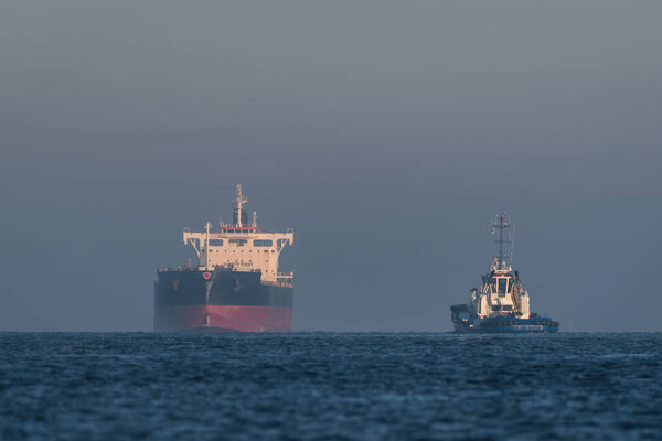 MARITIME TRANSPORT - Bulk carrier on waterway is sailing to seaport 