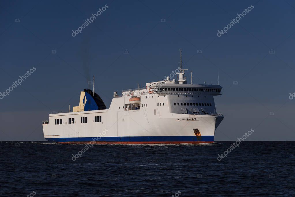 MARITIME TRANSPORT - Passenger and car ferry sail on the sea