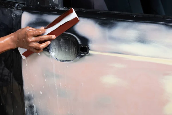 stock image Standard auto repair shop is repairing and repainting the car after the accident.