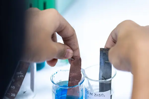 stock image Electroplating experiment in chemistry laboratory.