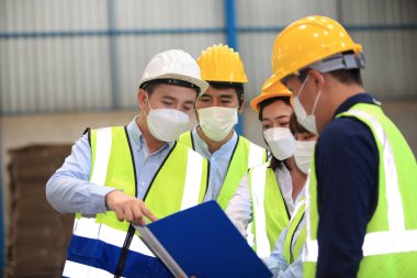 engineer team  meeting before working ,Business of  the logistic distribution or transportation Industry or shipping business, Container Cargo shipment  delivery , import export 