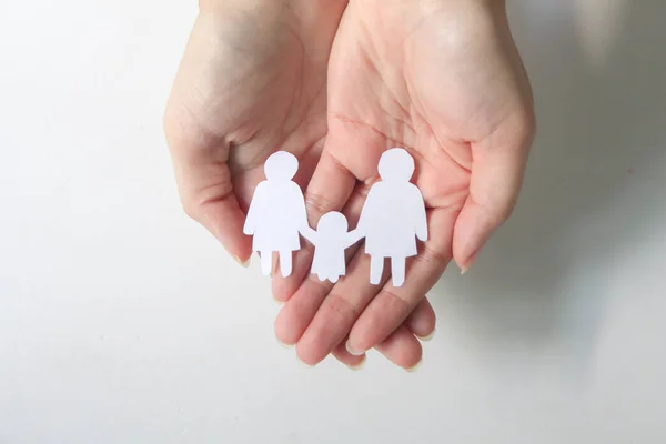 paper cut of Two women and children in family Same-sex marriage and adoption, homosexual lesbian couple.