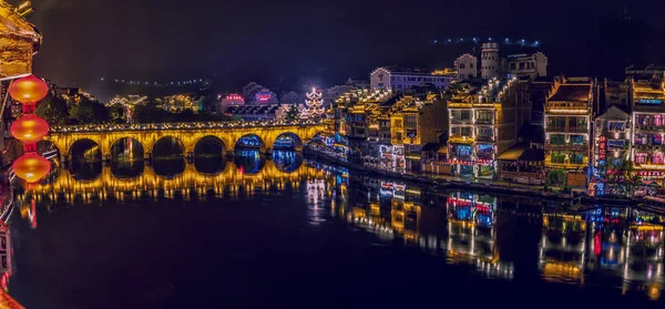 stock image The night scenery of Zhongyuan Ancient Town in Guizhou, China.