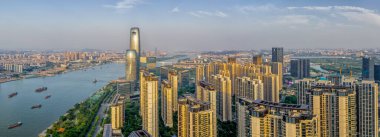 Çin 'in Guangzhou kentindeki Pazhou İş Bölgesi' nin alacakaranlık manzarası..